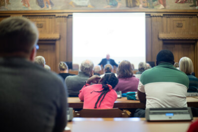 Spectators in the city council chamber